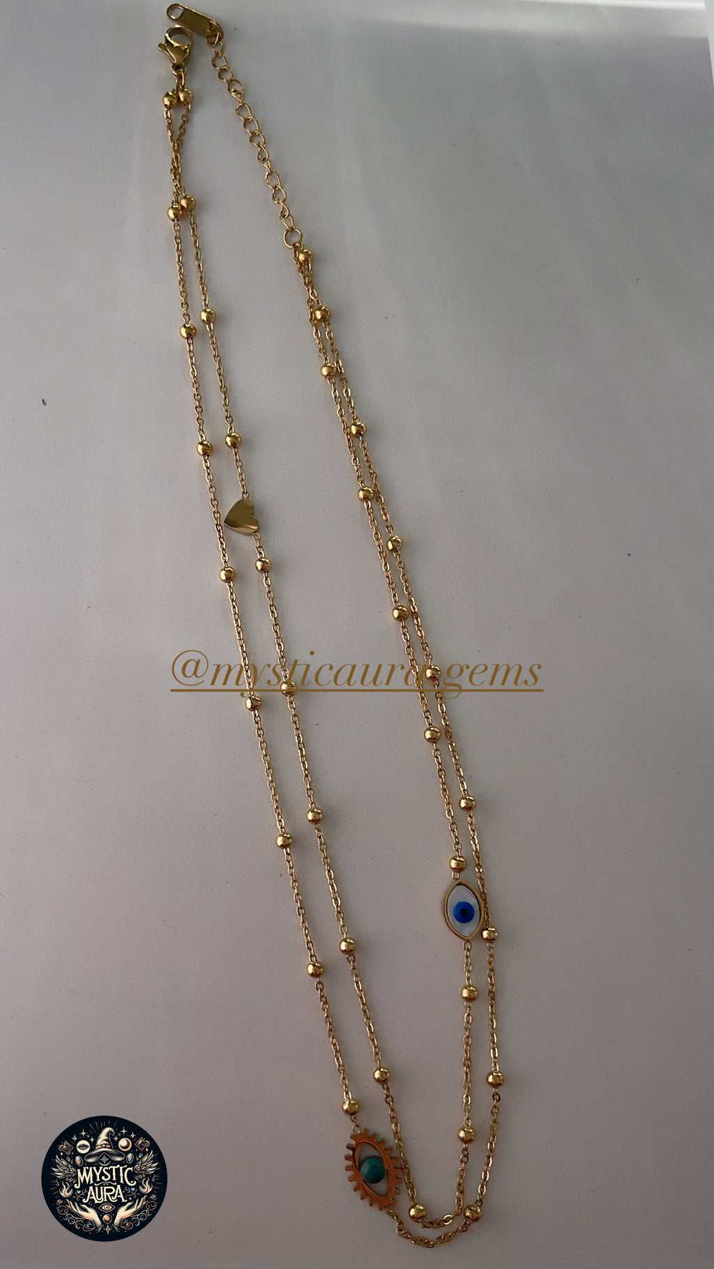 🧿 Collier double chaîne – Œil de protection doré