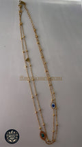 🧿 Collier double chaîne – Œil de protection doré