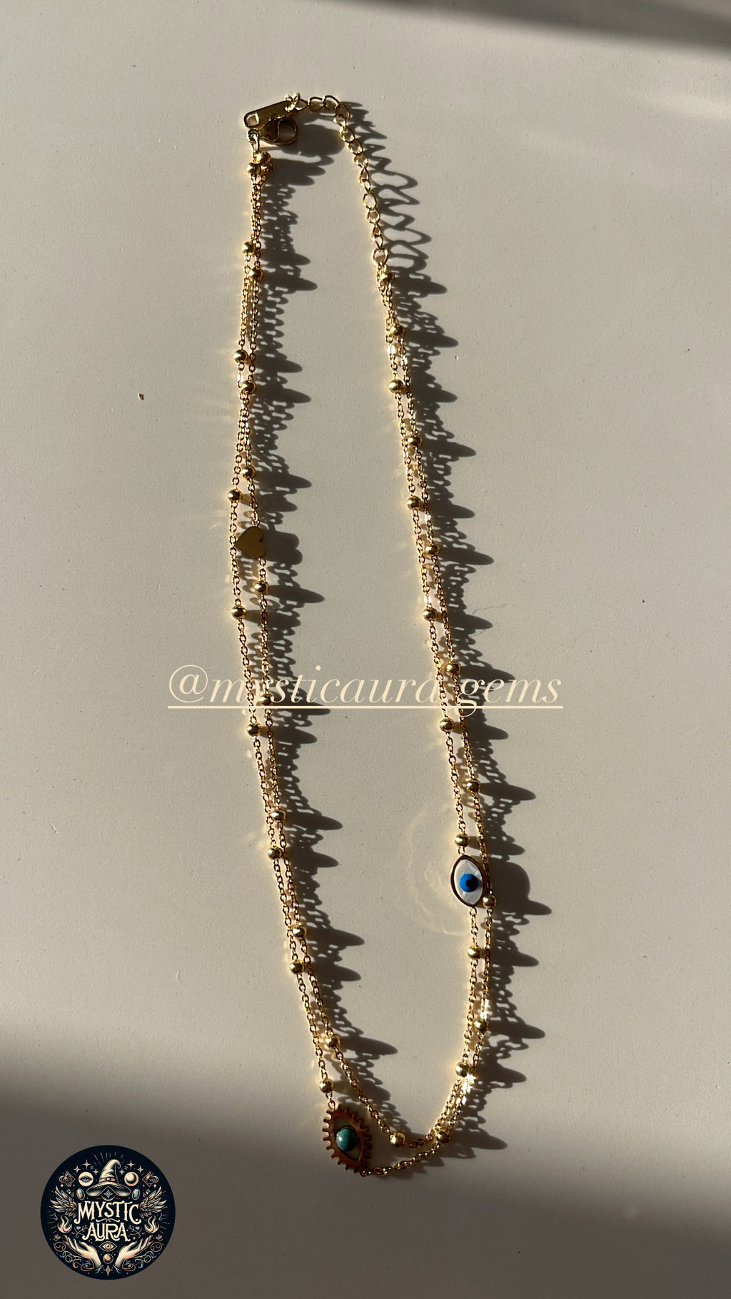🧿 Collier double chaîne – Œil de protection doré
